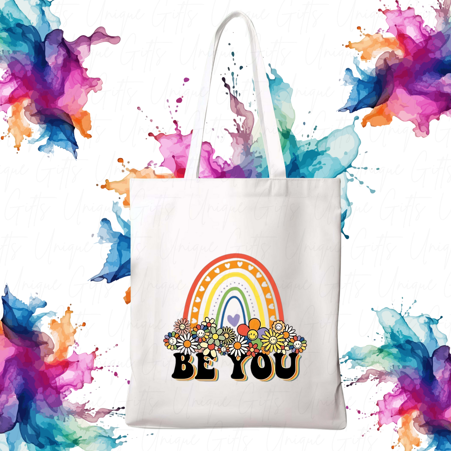 White tote bag with rainbow and flowers design on a colorful abstract background
