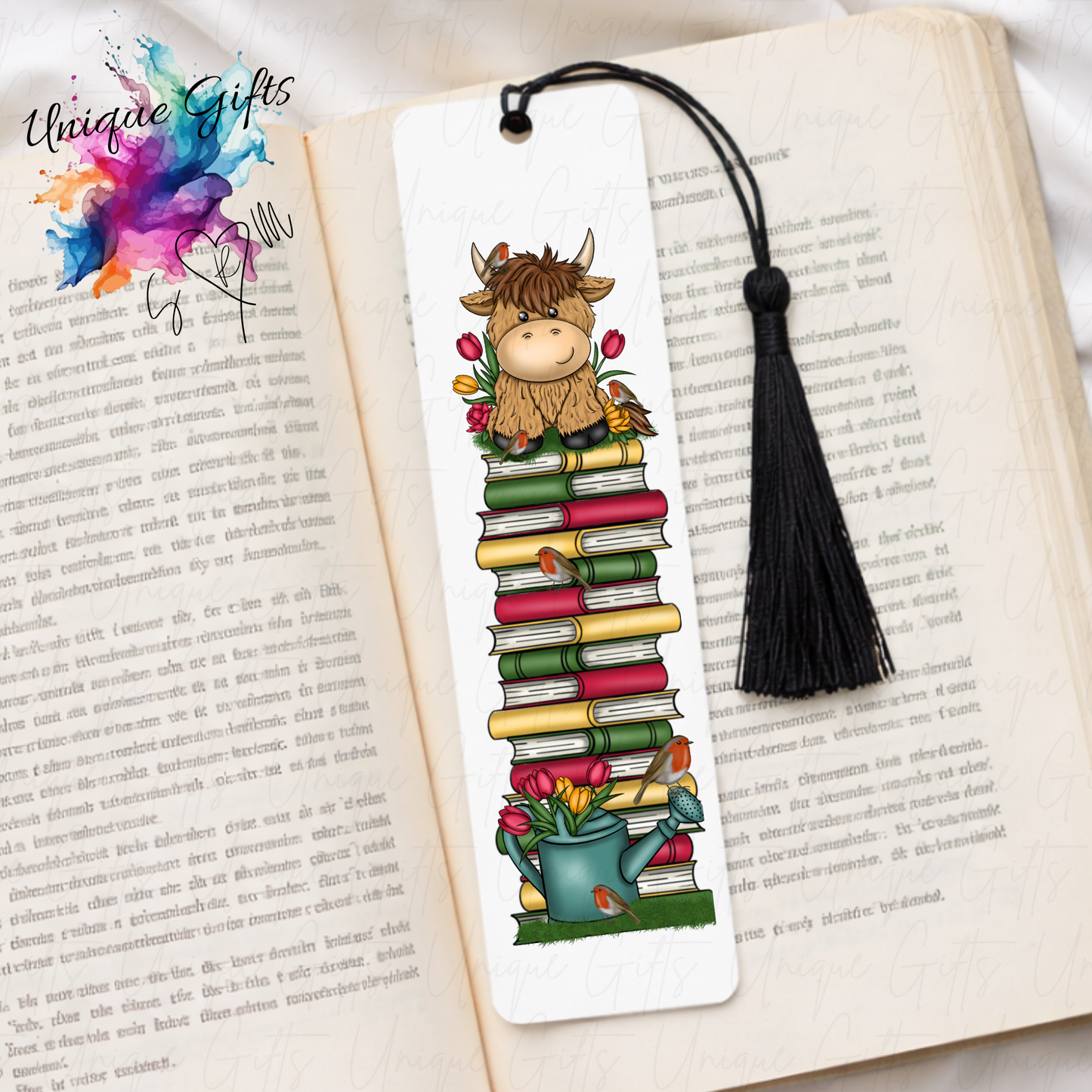 Personalised highland cow bookmark with robins and watering can – book stack design – aluminium with black tassel