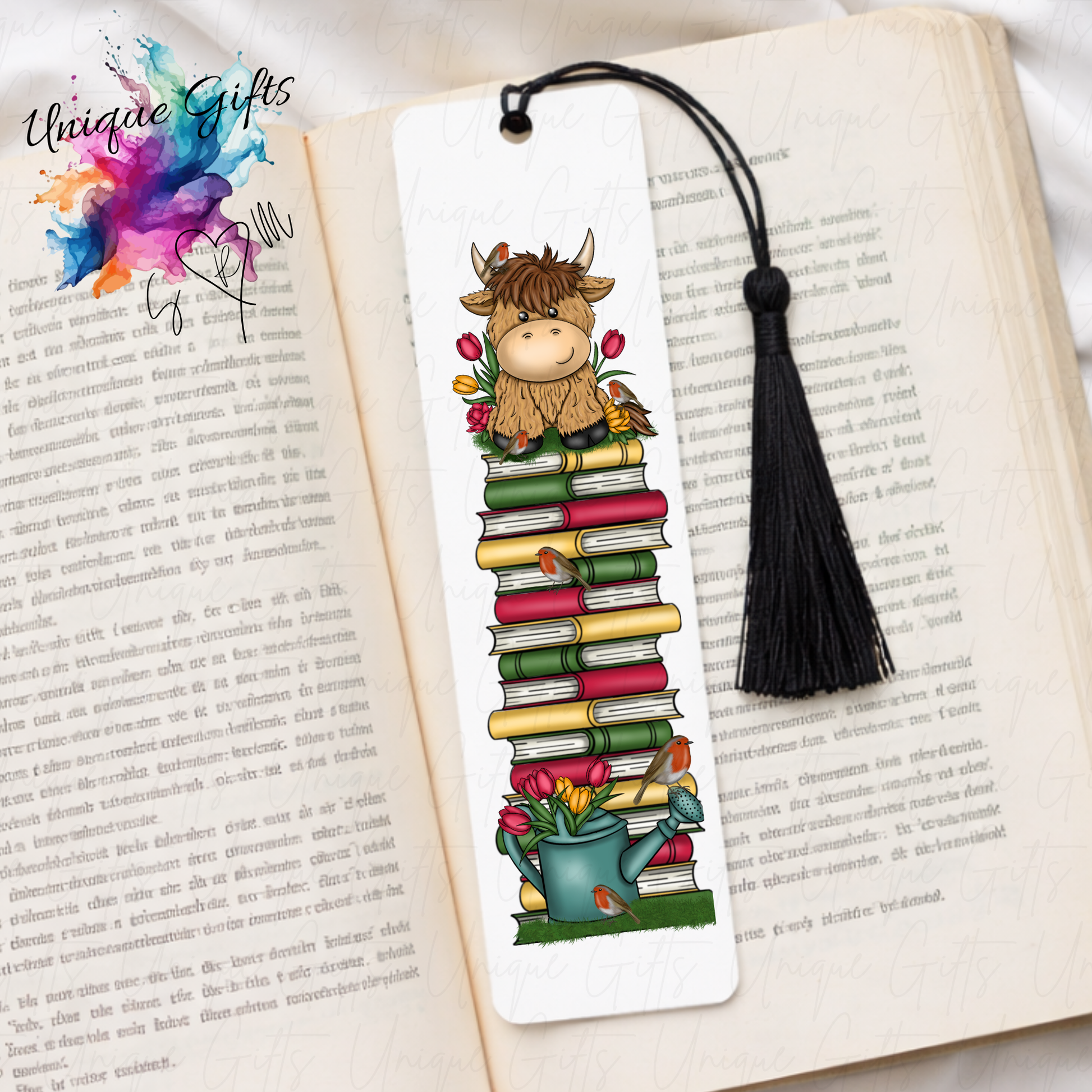 Personalised highland cow bookmark with robins and watering can – book stack design – aluminium with black tassel