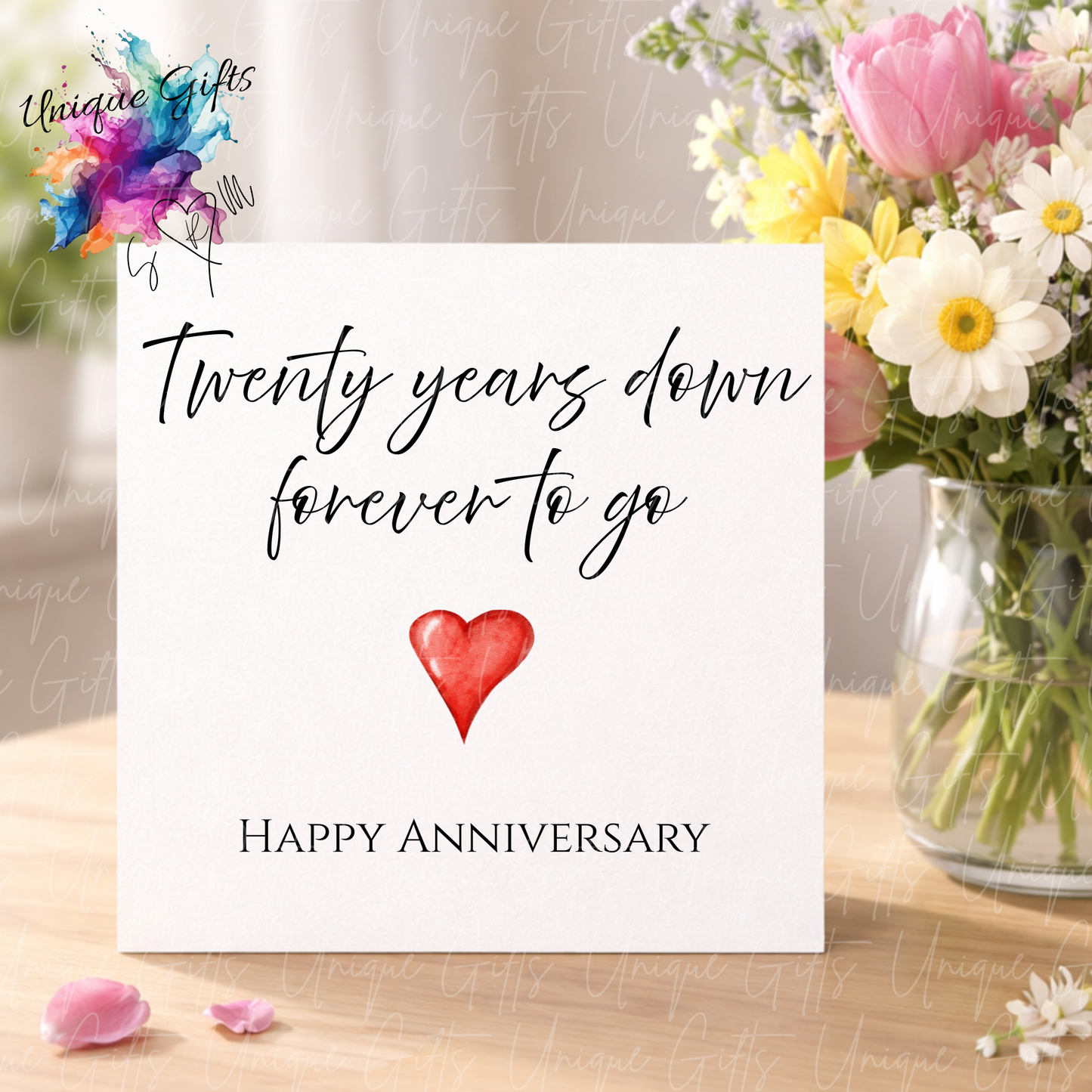 Twenty years down forever to go anniversary card displayed with flowers