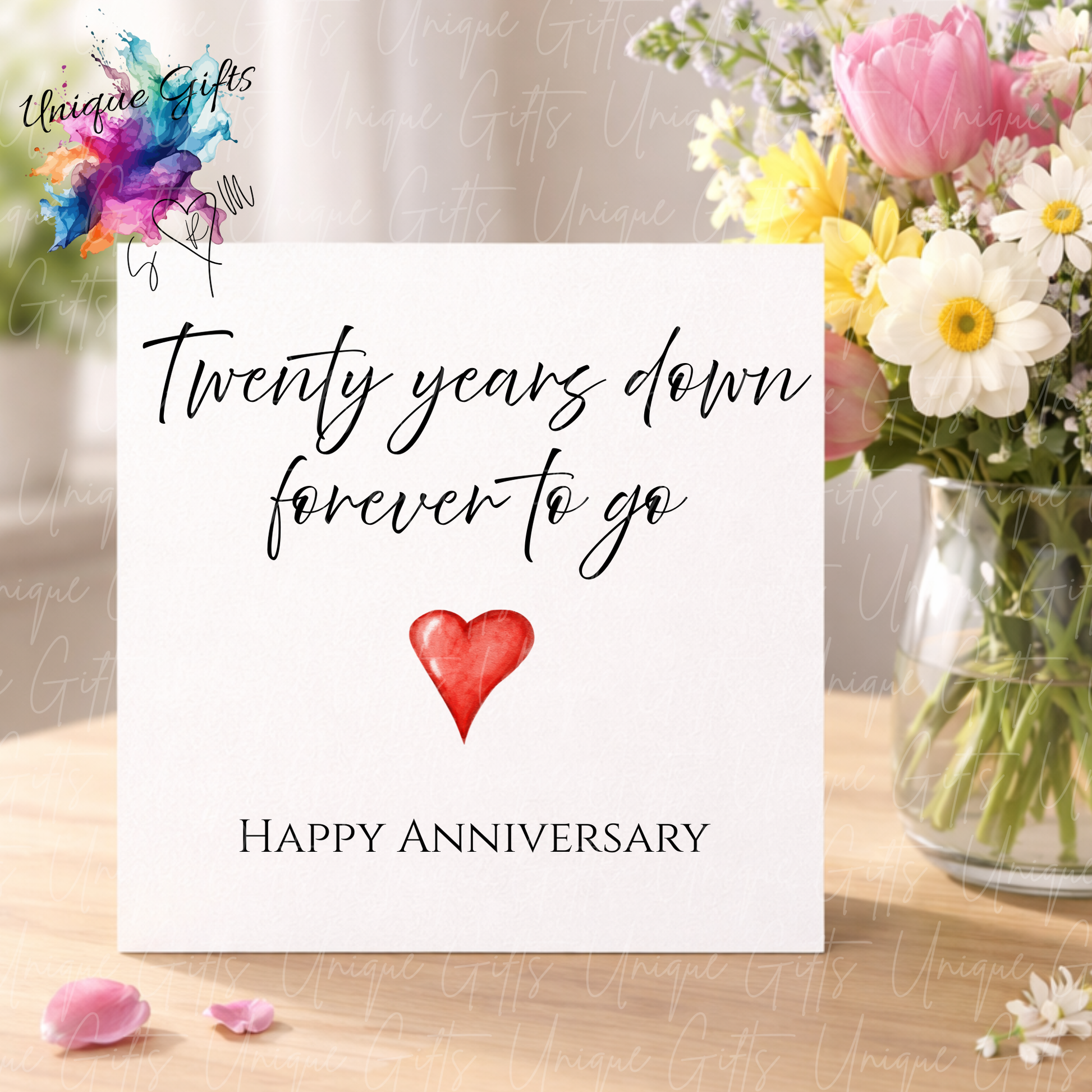 Twenty years down forever to go anniversary card displayed with flowers