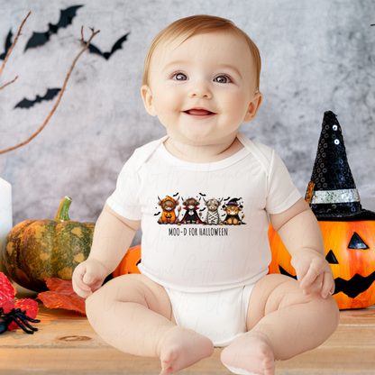 Baby wearing a Halloween-themed onesie with pumpkins and bats in the background.