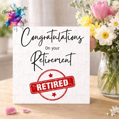 Retirement congratulations card displayed with flowers showing colourful paint splash and RETIRED stamp | Unique Gifts