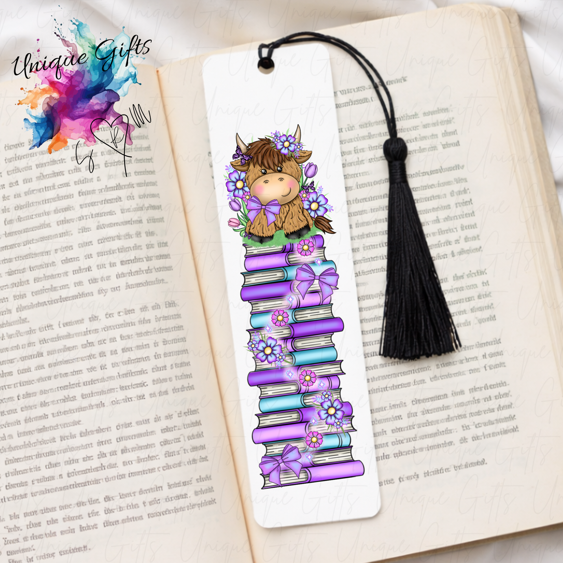 Personalised highland cow bookmark with purple flowers – book stack design – aluminium with black tassel