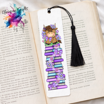 Personalised highland cow bookmark with purple flowers – book stack design – aluminium with black tassel